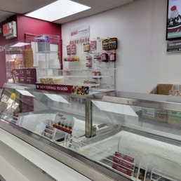 the inside of a deli shop