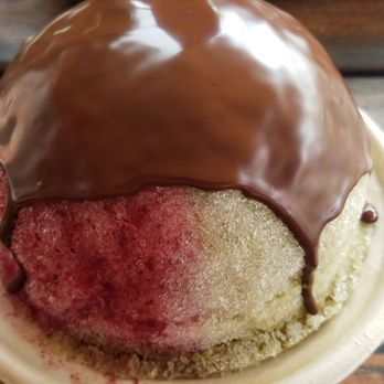 Kula Shave Ice - Regular size shaved ice with sugar-free mixed berry and coconut matcha flavors. Chocolate topping. (Chocolate ice cream underneath) $9 - Shaved Ice Near Me - Hilo, Hawaii