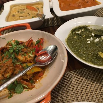 Kiran's - Prawn Bhuna, Chicken Tikka Masala, Palak Paneer, Navrattan Korma, Saffron Rice Pulao, & Buttered Naan. - Indian Near Me - Houston, Texas