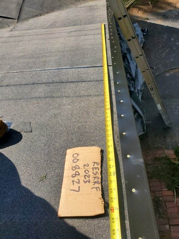 Slide of Keith Melady Roofing