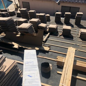 ALCC Construction - a lot of wood on the roof of a house - Roofing Near Me