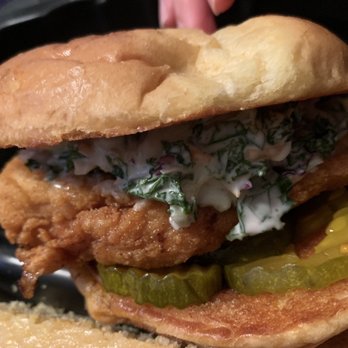 The Crispy Coop - Chicken Sandwich topped with creamy slaw and pickles - Chicken Wings Near Me - Columbus, Ohio The Crispy Coop - Chicken Sandwich topped with creamy slaw and pickles - Chicken Wings Near Me - Columbus, Ohio