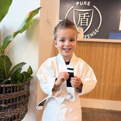 Pure Self Defense - That first stripe feeling! At our school, every student learns to believe in themselves & grow with confidence.Ready to start your journey?