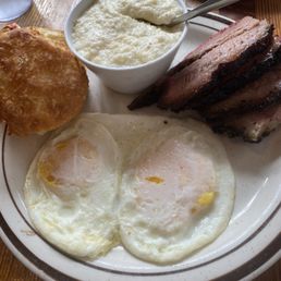 Brisket, eggs, grits, and a biscuit. Brisket, eggs, grits, and a biscuit.