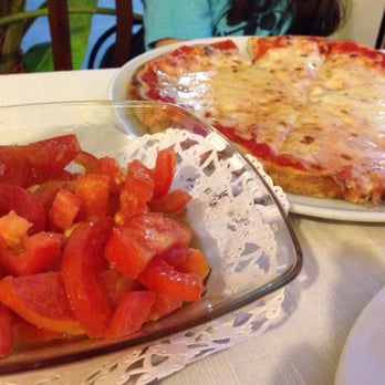 Gnà Sara - Pizza Margarita & insalata di pomodori - Mediterranean Near Me - San Vito Lo Capo, AG Gnà Sara - Pizza Margarita & insalata di pomodori - Mediterranean Near Me - San Vito Lo Capo, AG