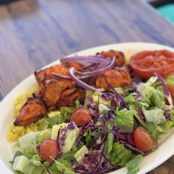 Waterfront Pizza - 7 oz. Spicy Chicken Tikka Kabob with rice and salad - Pizza Near Me - Foster City, California Waterfront Pizza - 7 oz. Spicy Chicken Tikka Kabob with rice and salad - Pizza Near Me - Foster City, California