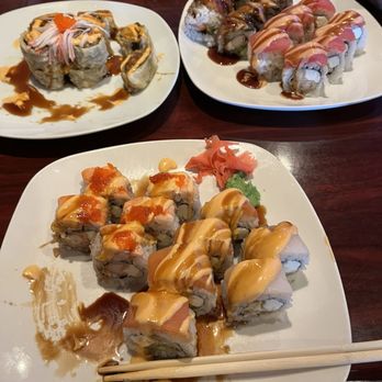 Oyako Sushi - The closest plate has the Twin Brothers on the left and the New Year on the right. The 2 back plates, I don't know. - Japanese Near Me - York, Pennsylvania