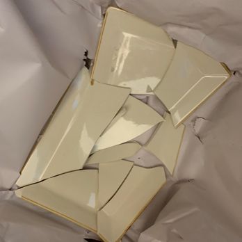 Two Small Men With Big Hearts - Broken dish - Movers Near Me - Richmond, British Columbia