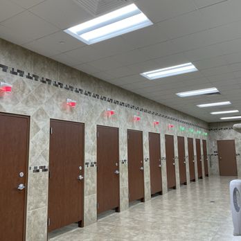Buc-ee’s - Restrooms has red and green traffic lights - Convenience Stores Near Me - Luling, Texas