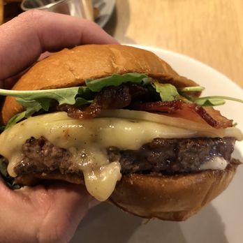 The Cut - Sweet and Spicy burger, with fresh arugula sticking out. - Burgers Near Me - Irvine, California