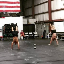 CrossFit Fredericksburg - Father vs. Son handstand race!