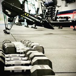 F45 Training - Bend West - Rowers and free weights.
