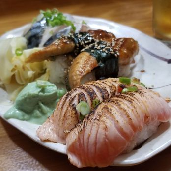 Saburo's - From right to left: seared salmon, unagi, and saba. - Japanese Near Me - Portland, Oregon Saburo's - From right to left: seared salmon, unagi, and saba. - Japanese Near Me - Portland, Oregon