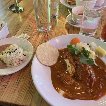 Elvira's - Chicken Hazelnut Nut Mole, pickled onions, cilantro, rice and beans - Mexican Near Me - Tubac, Arizona Elvira's - Chicken Hazelnut Nut Mole, pickled onions, cilantro, rice and beans - Mexican Near Me - Tubac, Arizona