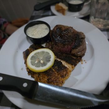 Linda's La Cantina - Mini Surf and Turf Filet Mignon wrapped in bacon and snapper. My friend seem to really enjoy it I ate the bacon it was yummy. - Steakhouses Near Me - Orlando, Florida