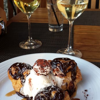 Pinstripes - Housemade Chocolate Profiteroles with free wine if you have their red bracelets. You have an option for white or red wine. - Bowling Near Me - Overland Park, Kansas Pinstripes - Housemade Chocolate Profiteroles with free wine if you have their red bracelets. You have an option for white or red wine. - Bowling Near Me - Overland Park, Kansas
