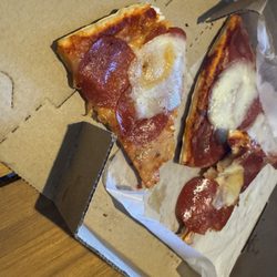 Cousin Vinnie's NY Pizza Cafe - This is the picture of the very small slice pizza of the picture taken.