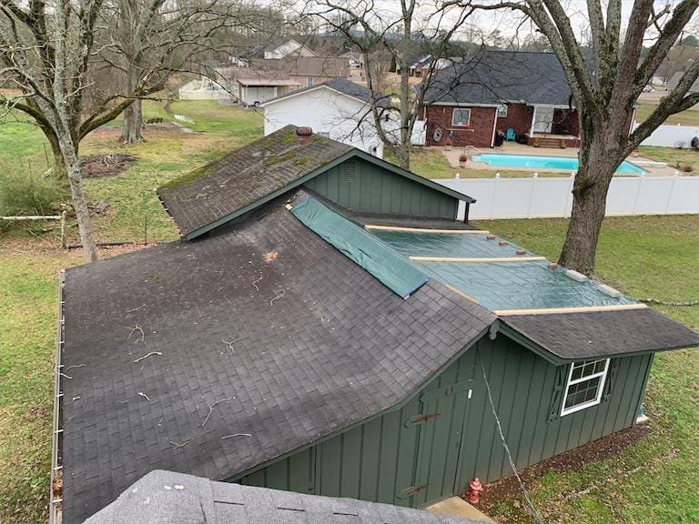 Slide of Tycon Roofing