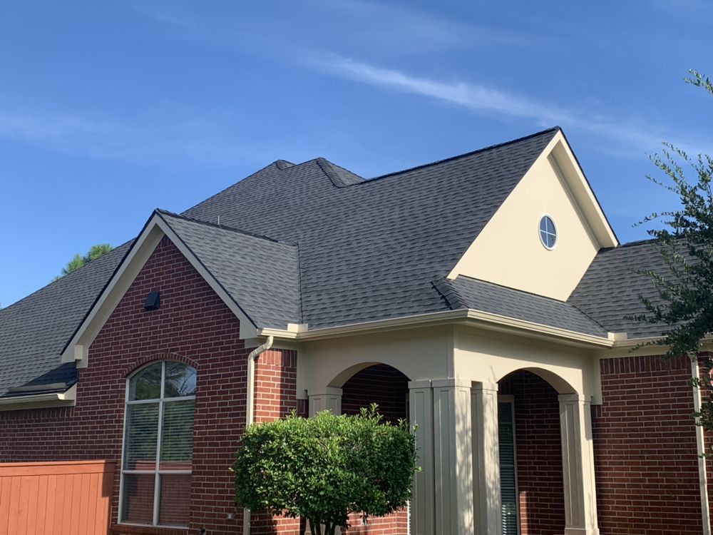 Slide of Cayne Roofing