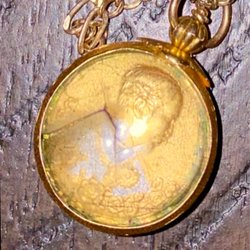 Jewelry & Watch Express - BEFORE: 20+ year old pendant from Thailand that Don fixed and polished clean.