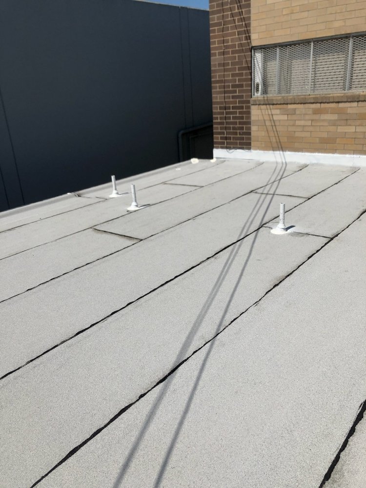 Slide of McCurdy Roofing