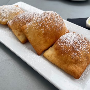 Barking Mad Cafe - Beignets - best thing we ordered!  The sauce is not too sweet! - Coffee & Tea Near Me - Gaithersburg, Maryland