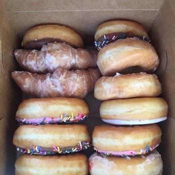 Hole in One Donuts - Dozen: Boston creme, glazed croissants, mixture of sprinkles and glazed and a strawberry filled. All yummy! - Donuts Near Me - Brandon, Florida