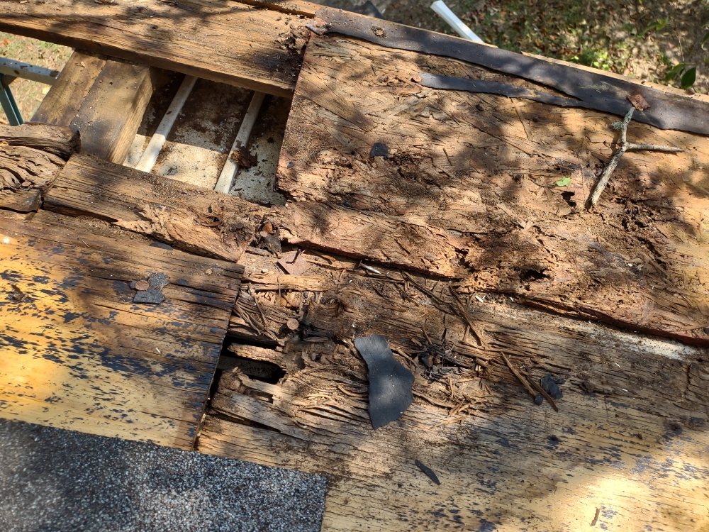 Slide of Moore's Roofing