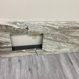 The countertop broke as we took it off the base. The countertop broke as we took it off the base.