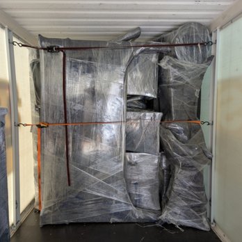 Scruffy City Movers - Pack job of a PODS storage container, stacked by professional movers. - Movers Near Me - Knoxville, Tennessee Scruffy City Movers - Pack job of a PODS storage container, stacked by professional movers. - Movers Near Me - Knoxville, Tennessee
