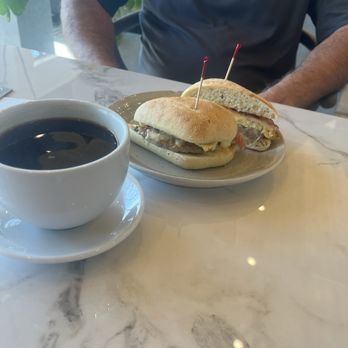 Cooper's Coffee + Eatery - Husband's coffee and his sandwich. - Cafes Near Me - Nelson, Missouri