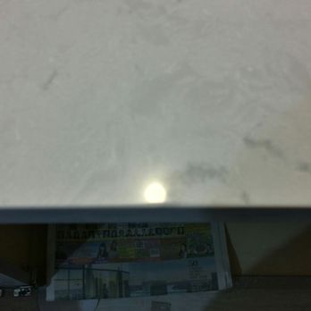 Desire K&B Design - Reflection of light near chipped area. - Countertop Installation Near Me - Queens, New York