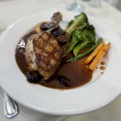 Il Fiore Ristorante - Grilled pork chop stuffed with mozzarella and prosciutto, broccoli, carrots and red potatoes (daily special)