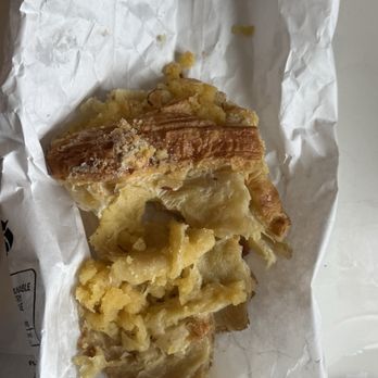 Paris Bakery Cafe - Throwing away most of the Almond Croissant - Bakeries Near Me - Monterey, California