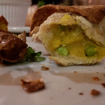 SunCafe - Interior of sunny samosas ($12). Decent, but also a slightly weird taste to the potatoes. - Vegan Near Me - Studio City, California