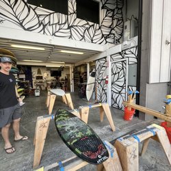 DingDocs Surfboard Repair - Their shop is located on backside of building. Just look for the black white floral artwork.
