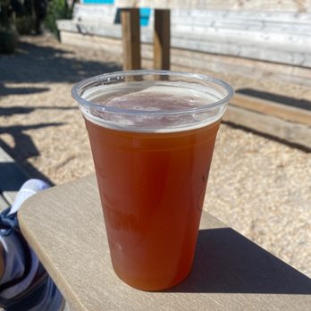 Lighthouse Beer & Wine - a cup of beer on a table - Beer, Wine & Spirits Near Me - Wrightsville Beach, North Carolina Lighthouse Beer & Wine - a cup of beer on a table - Beer, Wine & Spirits Near Me - Wrightsville Beach, North Carolina