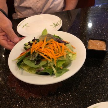 Ichimaru - House salad with peanut sauce .  It very fresh and crispy and the peanut sauce was delicious - Thai Near Me - Stuart, Florida
