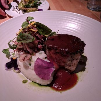 Mad & Vin - Herb encrusted sea bass. Delicious and flaky with a semi sweet sauce - New American Near Me - Solvang, California Mad & Vin - Herb encrusted sea bass. Delicious and flaky with a semi sweet sauce - New American Near Me - Solvang, California