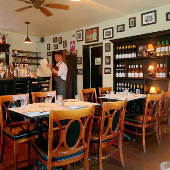 La Bonne Table - a man in a restaurant setting - French Near Me - San Diego, California