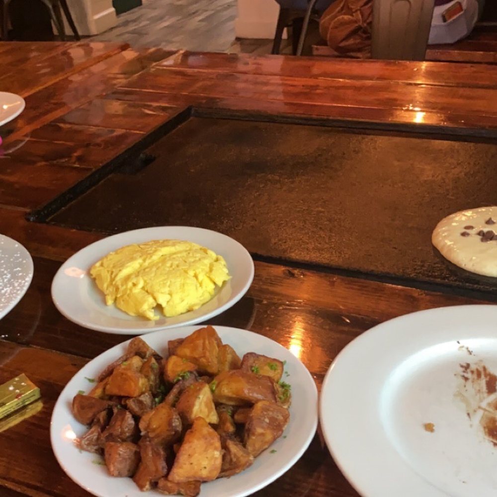 Backwater - Fried Gator Citrus Waffle, Chocolate chip pancakes, Home Fries, scrambled eggs - Breakfast & Brunch Near Me - Melbourne, Florida Backwater - Fried Gator Citrus Waffle, Chocolate chip pancakes, Home Fries, scrambled eggs - Breakfast & Brunch Near Me - Melbourne, Florida