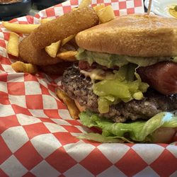 Jack N Grill - The Cristobal burger. Comes with 10 ounce patty, ham, hotdog, guacamole and green chile.