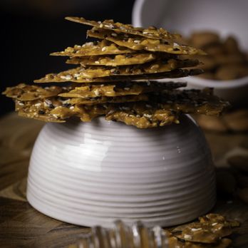 Dem' Nutz - Closeup of how thin the Almond Crack are - Candy Stores Near Me Dem' Nutz - Closeup of how thin the Almond Crack are - Candy Stores Near Me