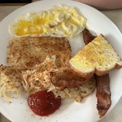 Kelly's Restaurant - Eggs, bacon, potatoes, and toast, with a spurt of catch up his initiative