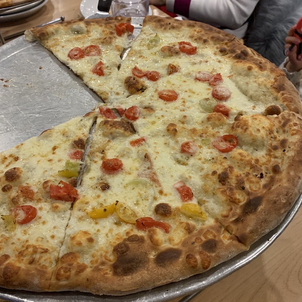 Blue Moose Pizza - This is supposed to be the winter pizza. Looks like they just threw whatever leftover toppings they had on it. - Pizza Near Me - Avon, Colorado Blue Moose Pizza - This is supposed to be the winter pizza. Looks like they just threw whatever leftover toppings they had on it. - Pizza Near Me - Avon, Colorado