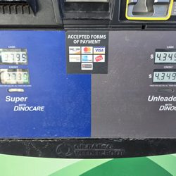 Nebraskaland Tire & Service - July 29, 2026. gas prices at Sinclair gas station in front of Nebraskalnd Tire. Rare tap-to-pay pump, but out of paper to print receipt