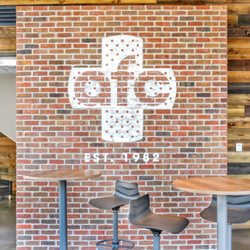 AFC Urgent Care Thornton - AFC Logo on brick wall