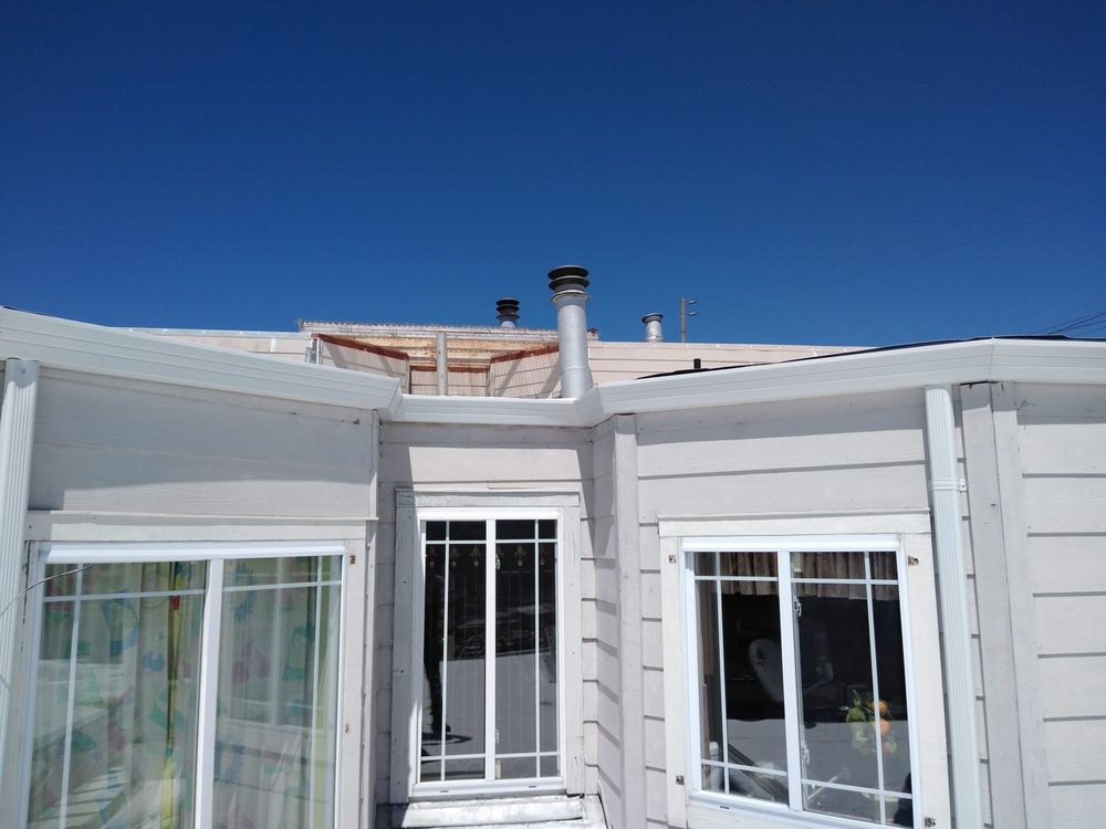 Slide of JB Rain Gutter installation