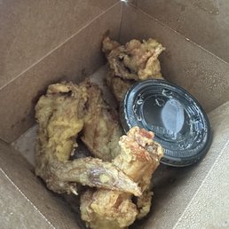 Chicken Wings and clear dipping sauce Chicken Wings and clear dipping sauce