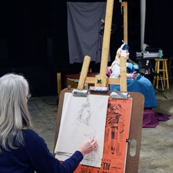 The Art Center - Student sketching during a figure drawing class